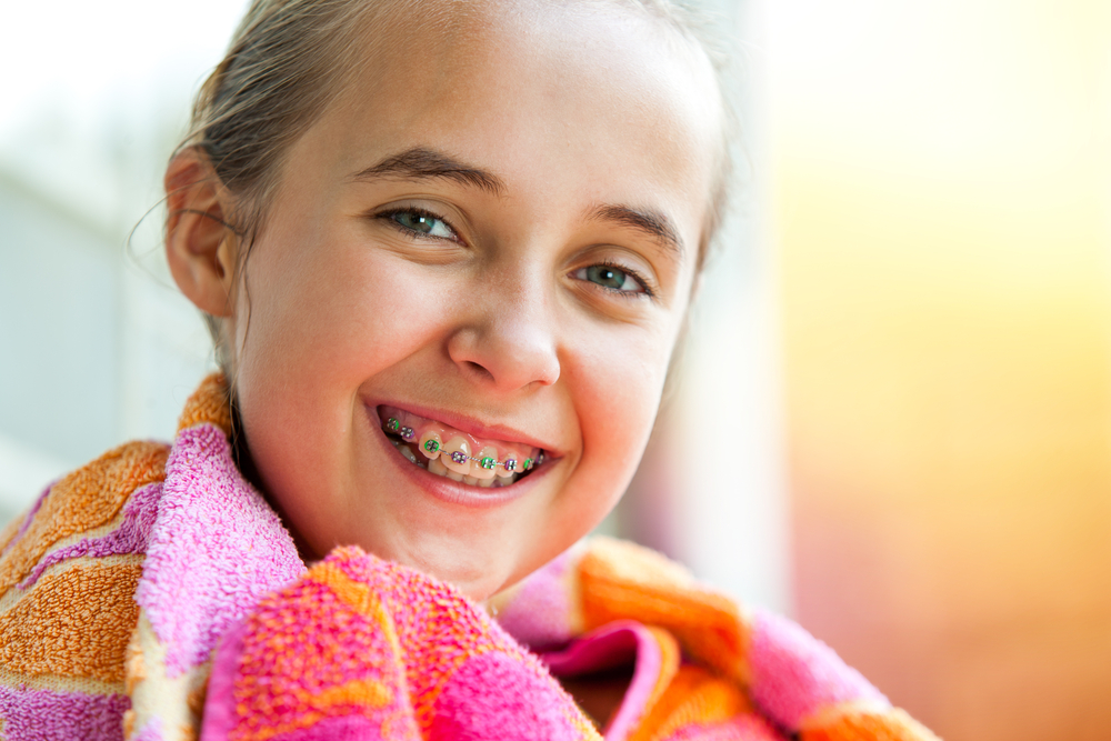 young girl with braces