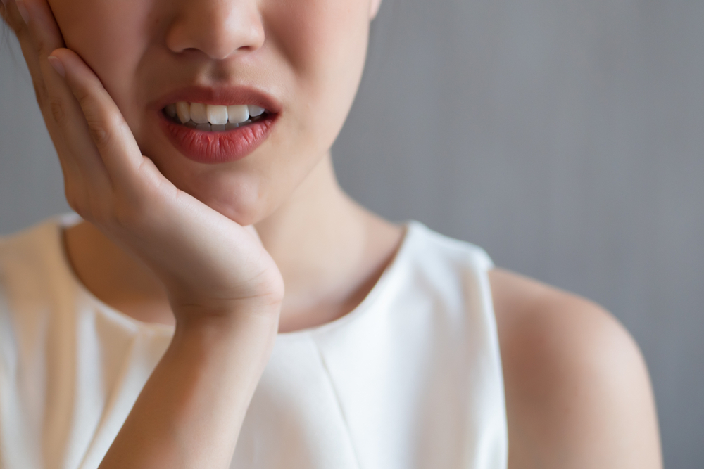 woman with mouth pain