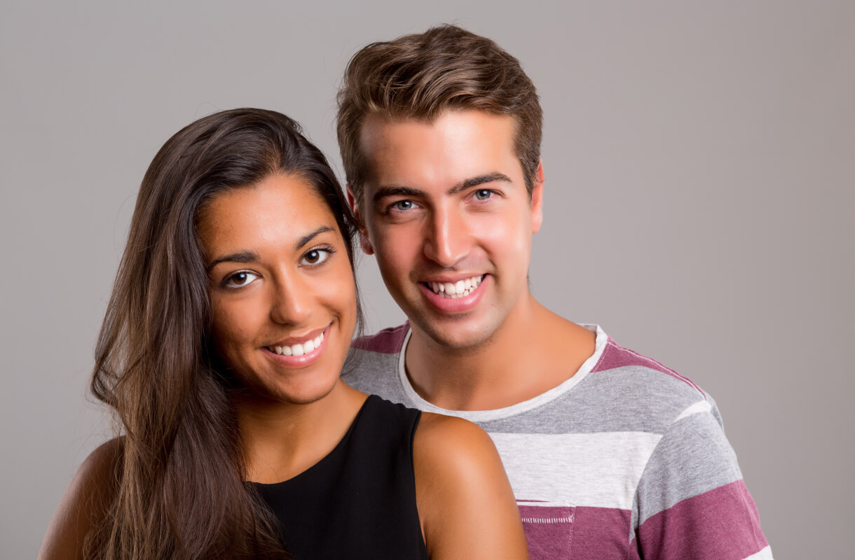 young couple smiling